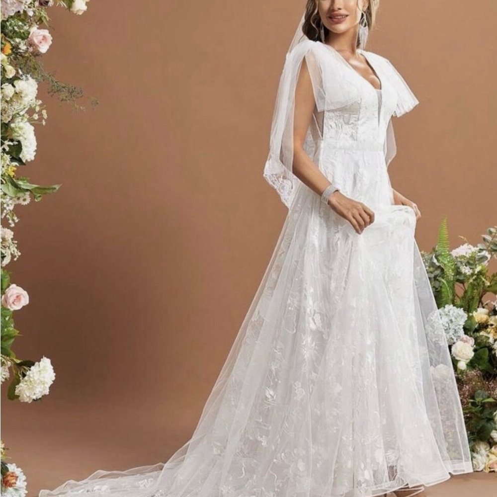 Elegant White Bridal Gown with Cape
